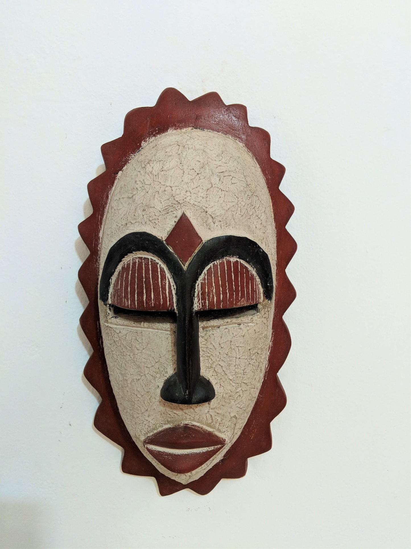 Handcrafted African wooden wall mask. Ideal for unique gifts